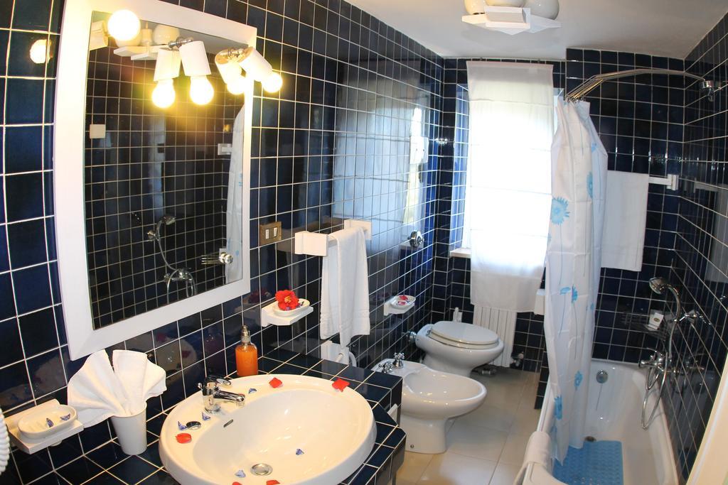 كانّيجوني B&B Oltremare الغرفة الصورة